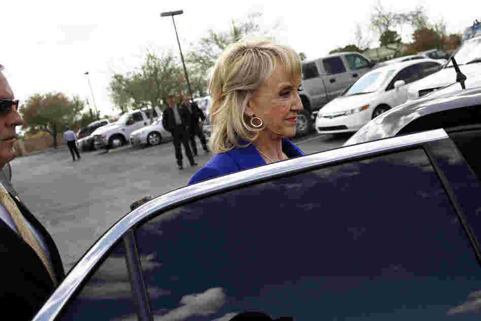 Arizona Gov. Jan Brewer, who endorsed Mitt Romney in February, cast her vote for the former Massachusetts governor in Glendale. 