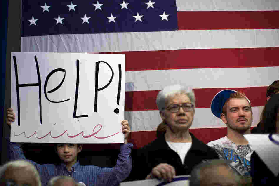 Newt Gingrich supporters attend a campaign stop in Dalton, Ga. Gingrich skipped Michigan and Arizona to visit his home state, which votes March 6. 