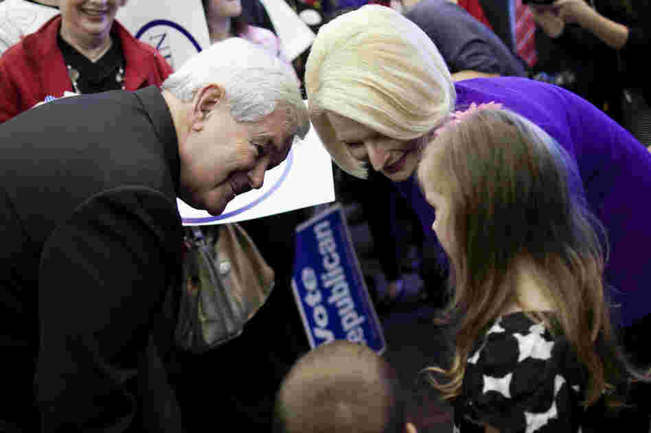 Gingrich and wife Callista meet Kaylan Cape, 5, in Dalton. The former Georgia congressman said Tuesday that he "unequivocally" has to win there. 
