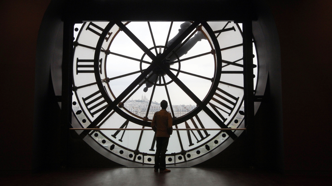 Leap day is the perfect moment to contemplate time. Here a man looks at the Seine river through the giant clock of the Orsay Museum in Paris. 