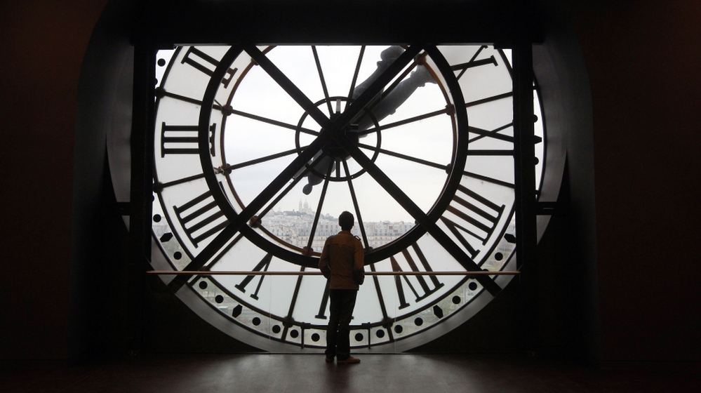 Leap day is the perfect moment to contemplate time. Here a man looks at the Seine river through the giant clock of the Orsay Museum in Paris. 