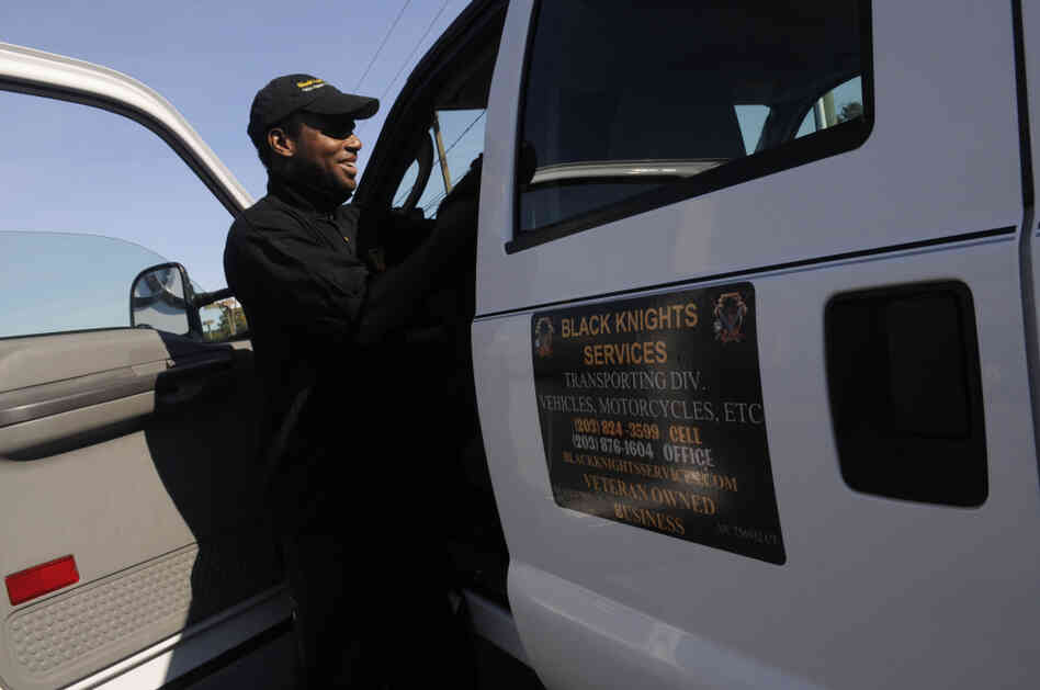 Edward Young, whose automotive transport business is based in Milford, Conn., arrives to pick up a car to be delivered to Pennsylvania from the Valenti auto dealership in Watertown, Conn. Edward Young, whose automotive transport business is based in Milford, Conn., arrives to pick up a car to be delivered to Pennsylvania from the Valenti auto dealership in Watertown, Conn.