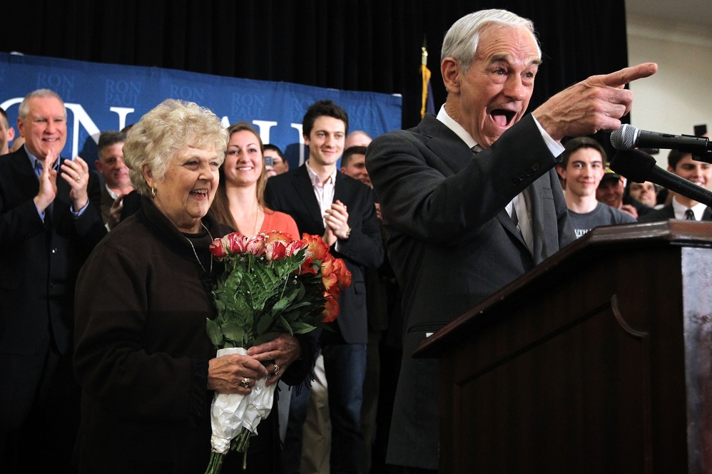 Ron Paul drew large crowds in Springfield, Va., while finishing third and fourth in Michigan and Arizona. Virginia's primary is March 6. 