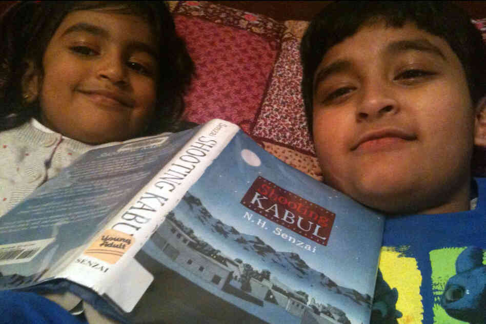 Arghya Roy, 8, Tarrytown, N.Y.: Here is a pic of me and my sister, Yagyesha, 5 years old, reading in my favorite spot in the world — our parents' bed. It is my favorite because it is so comfy!!!!