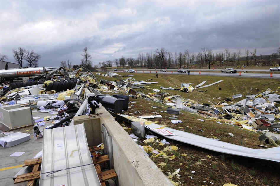 Debris is scattered near Harry Owen Trucking in Elizabethtown, Ky.  