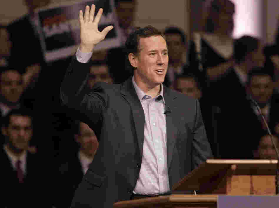 Republican presidential candidate Rick Santorum, shown at Temple Baptist Church in Powell, Tenn., on Wednesday, says John F. Kennedy set the foundation for expelling faith from politics.