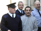 Essam Eid is led into Dublin, Ireland's Four Courts in 2008. Essam Eid is led into Dublin, Ireland's Four Courts in 2008.