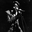 The inimitable James Brown sings on stage at the Olympia theater, Paris, France. The inimitable James Brown sings on stage at the Olympia theater, Paris, France.