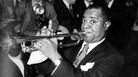 Louis 'Satchmo' Armstrong, the great jazz trumpeter and vocalist playing at the Savoy Hotel, London. Louis 'Satchmo' Armstrong, the great jazz trumpeter and vocalist playing at the Savoy Hotel, London.