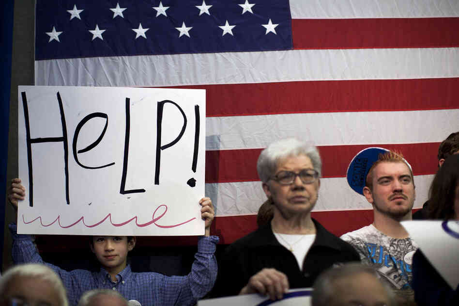 Newt Gingrich supporters attend a campaign stop in Dalton, Ga. Gingrich skipped Michigan and Arizona to visit his home state, which votes March 6. 