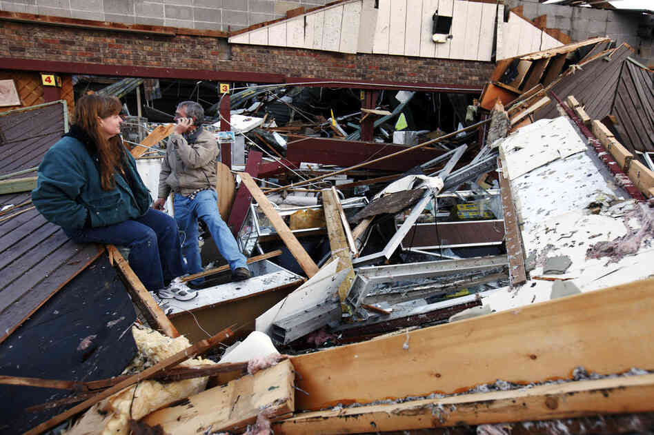 The storms, which spawned at least one tornado, destroyed Sherry Cousins and her brother Bruce Wallace's secondhand store in Branson, Mo. 