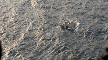 A Japanese home drifts in the Pacific Ocean, two days after the Japanese earthquake and tsunami. Photo provided by the U.S. Navy. A Japanese home drifts in the Pacific Ocean, two days after the Japanese earthquake and tsunami. Photo provided by the U.S. Navy.