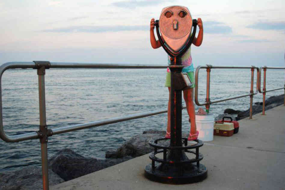 Jean-Marie Toher, 14: This is a photo of my cousin, Jamie, looking through one of those binocular machines that you always see on the boardwalk. Jamie is 6 and came to visit my family while we were on a family vacation on Long Beach Island, N.J.  I just love this picture. It makes me laugh.