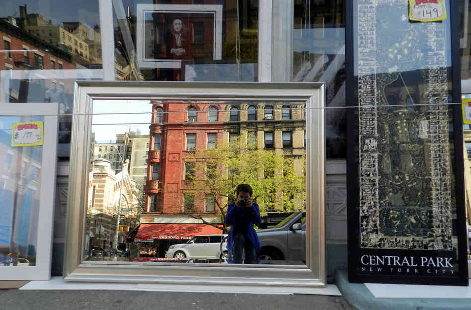 Stephen Boyd, 12: I took this picture in New York city.  I like that the mirror in the storefront reflects the buildings and the street and me taking the picture!
