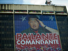 A huge photograph of Venezuelan President Hugo Chavez is displayed on the facade of state-owned oil company PDVSA (Petroleos de Venezuela) in Caracas on Wednesday. The text reads, "Move forward, commander." A huge photograph of Venezuelan President Hugo Chavez is displayed on the facade of state-owned oil company PDVSA (Petroleos de Venezuela) in Caracas on Wednesday. The text reads, "Move forward, commander."