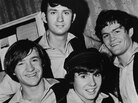 Promotional portrait of the popular music and television group the Monkees, dressed in matching shirts and vests, 1967. From left, Peter Tork, Michael Nesmith (back), Davy Jones (fore), and Mickey Dolenz. (Photo by NBC Television/Courtesy of Getty Images) Promotional portrait of the popular music and television group the Monkees, dressed in matching shirts and vests, 1967. From left, Peter Tork, Michael Nesmith (back), Davy Jones (fore), and Mickey Dolenz. (Photo by NBC Television/Courtesy of Getty Images)