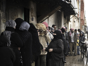 Syrians line up for bread outside a bakery in Qusayr on Thursday. After a month of heavy fighting in parts of Homs, civilians describe the conditions as miserable. Syrians line up for bread outside a bakery in Qusayr on Thursday. After a month of heavy fighting in parts of Homs, civilians describe the conditions as miserable.
