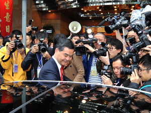 The other top candidate for chief executive, Leung Chun-ying (center, shown here Feb. 23), is also under scrutiny, for an alleged conflict of interest while judging a design contest for an arts complex - in which he allegedly voted for a company linked to his own. The other top candidate for chief executive, Leung Chun-ying (center, shown here Feb. 23), is also under scrutiny, for an alleged conflict of interest while judging a design contest for an arts complex - in which he allegedly voted for a company linked to his own.