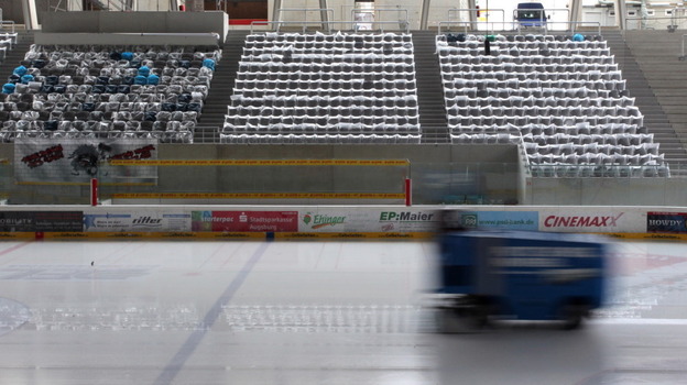 An ice-resurfacing machine races across a rink at Curt-Frenzel-Stadion in Augsburg, Germany. 