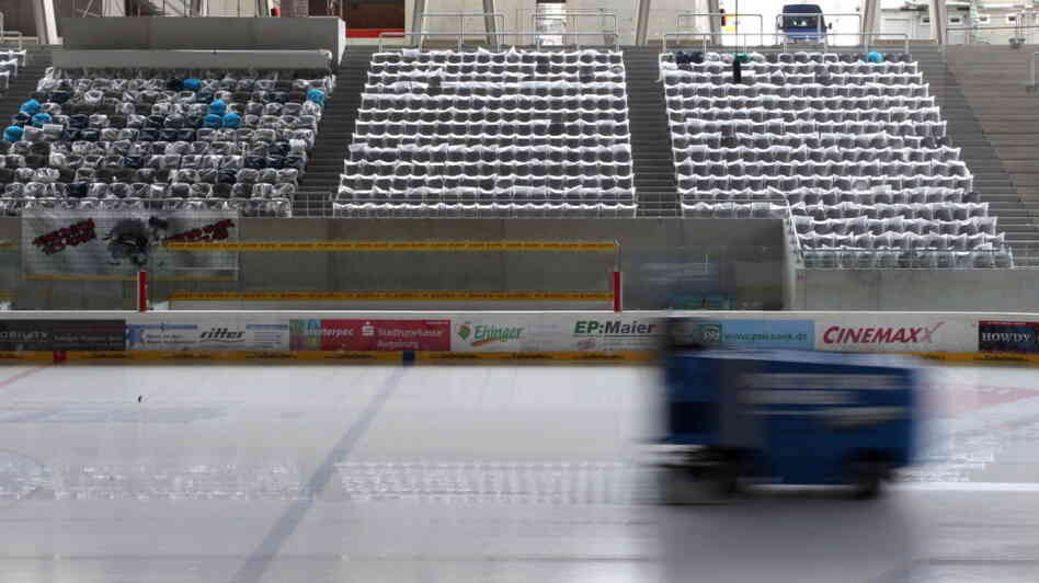 An ice-resurfacing machine races across a rink at Curt-Frenzel-Stadion in Augsburg, Germany. 