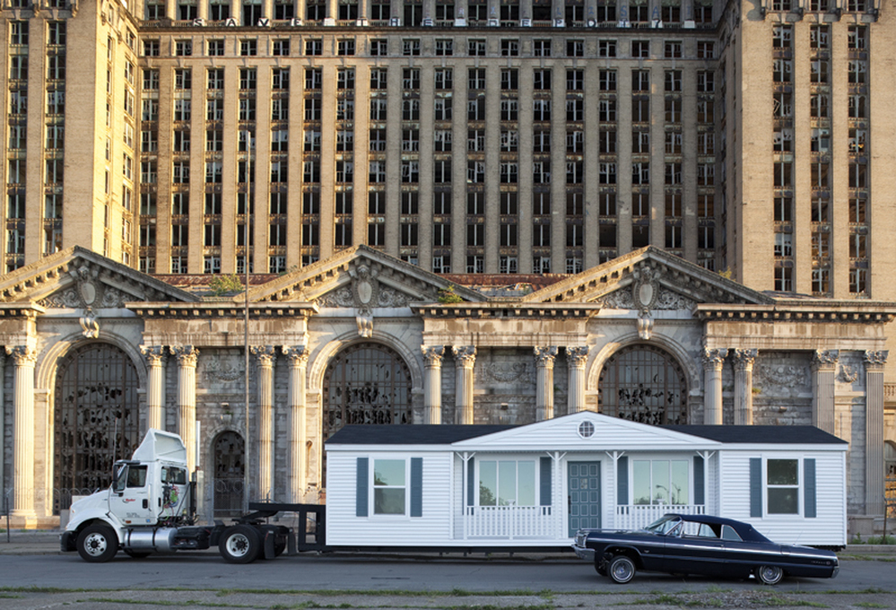Mike Kelley built a replica of his childhood home and repositioned it around Detriot. Three of his videos are on display at the Whitney. Above The Mobile Homestead is pictured in front of the abandoned Detroit Central Train Station. Kelley died in January.