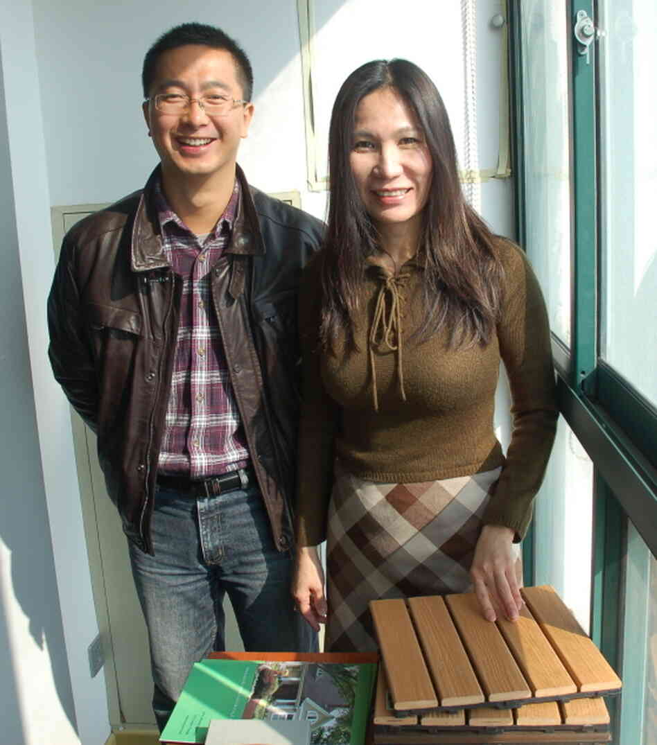 Jacky Jiang and Rosalia Yang, with imitation-wood flooring. Jacky Jiang and Rosalia Yang, with imitation-wood flooring.