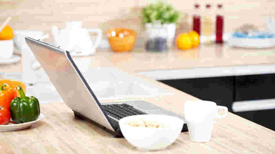 The laptop is replacing the recipe box in many American kitchens.