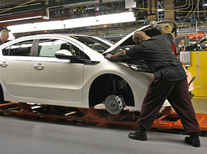 Workers assemble a Chevrolet Volt at GM's Detroit Hamtramck Assembly Plant in October. The auto maker says it will idle the plant for five weeks, to allow demand to catch up with inventory. Workers assemble a Chevrolet Volt at GM's Detroit Hamtramck Assembly Plant in October. The auto maker says it will idle the plant for five weeks, to allow demand to catch up with inventory.