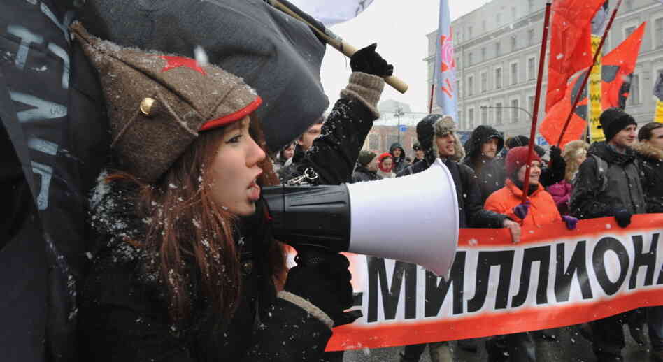 Russian demonstrators protest in St. Petersburg against Prime Minister Vladimir Putin's expected return to the Kremlin.