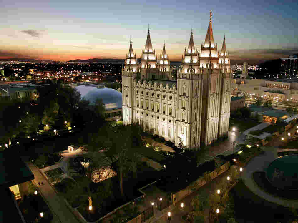 The sun sets behind the Mormon Temple, the centerpiece of Temple Square, in Salt Lake City.