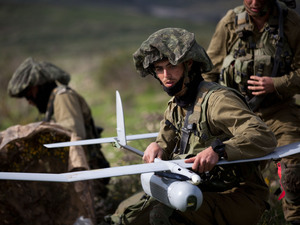 Israeli soldiers get ready to launch the Skylark drone during a drill in January. Israelis are required to serve in the military, and an exemptions for ultra-Orthodox Jews has created a fierce debate. Israeli soldiers get ready to launch the Skylark drone during a drill in January. Israelis are required to serve in the military, and an exemptions for ultra-Orthodox Jews has created a fierce debate.