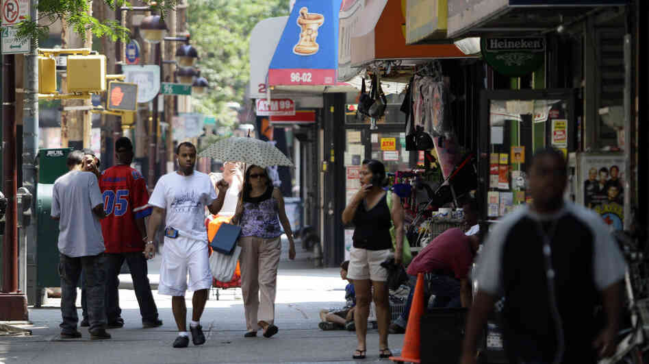 Pedestrians walk along a section of Jamaica Avenue in Woodhaven, Queens, New York. The neighborhood is part of an area targeted for congressional redistricting, but the process is still dragging on as the state's primary draws near. Pedestrians walk along a section of Jamaica Avenue in Woodhaven, Queens, New York. The neighborhood is part of an area targeted for congressional redistricting, but the process is still dragging on as the state's primary draws near.