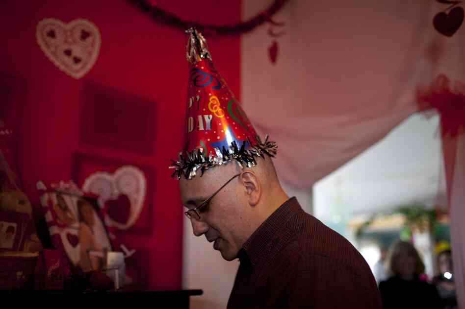 Lopez walks through his bedroom at his parents' house. As part of the homecoming celebrations, each room in the house was decorated for a different holiday. His room was decorated for Valentine's Day and Father's Day.