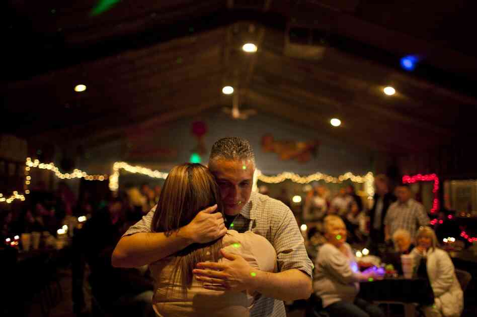 Lopez dances with his daughter, Nikki, for the first time in his life during the fundraiser in Amarillo.