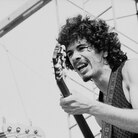 Carlos Santana with bassist David Brown performing at Woodstock.