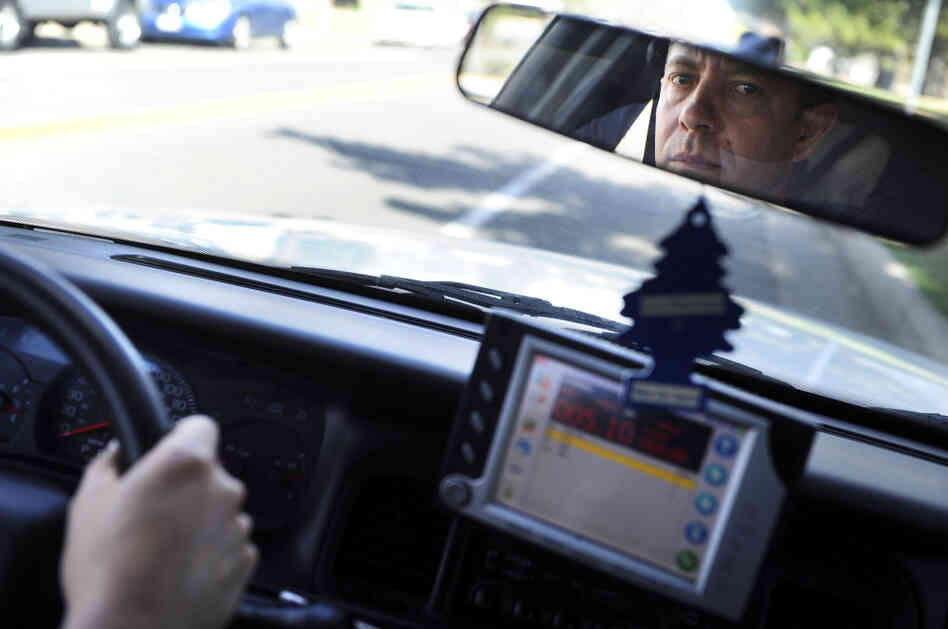 Max DeBarros drives his Metro Taxi in Denver. Police credit him with helping crack a hit-and-run case by recording and reporting the license plate number of the truck involved. Max DeBarros drives his Metro Taxi in Denver. Police credit him with helping crack a hit-and-run case by recording and reporting the license plate number of the truck involved.