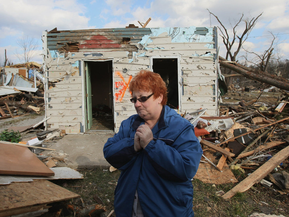 In Henryville, Ind., on Sunday, Janet Clark stood outside what remains of her home, which was destroyed in Friday's tornado.