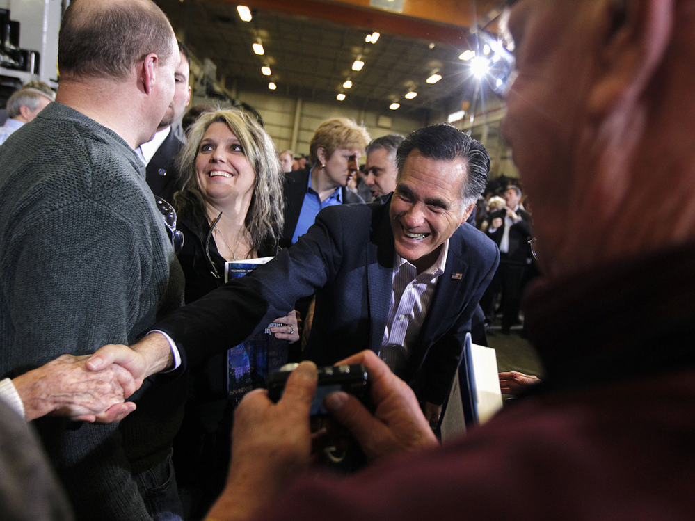 Mitt Romney greets supporters in Youngstown, Ohio, Monday, March 5, 2012. 