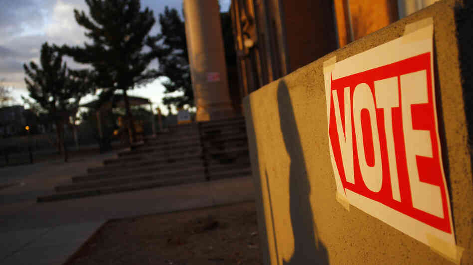 Ten states hold nominating contests on Tuesday. Here, a voter walks to a polling station in Phoenix on Feb. 28, 2012. 
