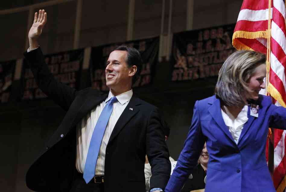 Rick Santorum and his wife, Karen, arrive at a rally in Steubenville, Ohio. 