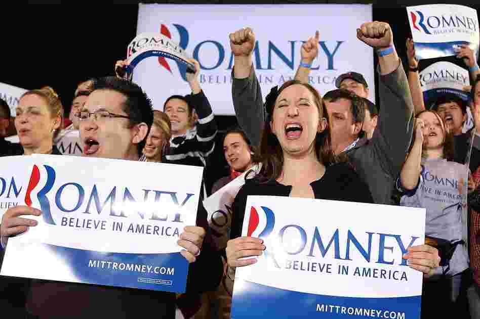 Romney supporters celebrate during a primary night gathering on Tuesday in Boston. 