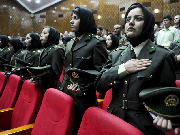 Afghan female cadets attend their graduation ceremony at the Military Training Center in Kabul, the Afghan capital, May 19. Some women say they joined the security forces in order to serve their country, but many say it's because the pay is better than working as a maid or teacher.