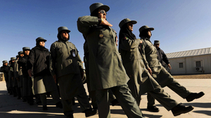 Afghan female police officers march at the Police Training Center on the outskirts of Herat province in western Afghanistan on Dec. 8.