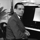 Cole Porter at the piano. Cole Porter at the piano.