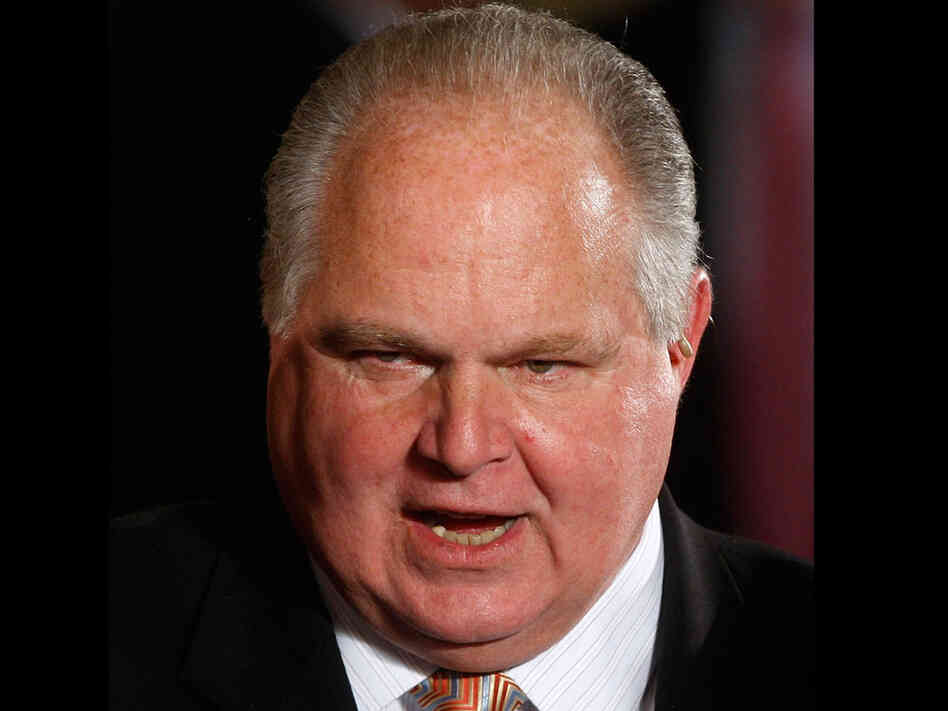 In this Jan. 13, 2009 file photo, conservative talk show host Rush Limbaugh talks with guests in the East Room of the White House in Washington. In this Jan. 13, 2009 file photo, conservative talk show host Rush Limbaugh talks with guests in the East Room of the White House in Washington.