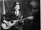 One of two existing photographs of Robert Johnson. One of two existing photographs of Robert Johnson.