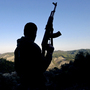 A member of the Free Syrian Army looks at the valley in the village of Ain al-Baida, in Syria's Idlib province, near the Turkish border, in December. Syrians fleeing the fighting in their country are flowing out across the border with Turkey, but opposition fighters say very few weapons are flowing in. A member of the Free Syrian Army looks at the valley in the village of Ain al-Baida, in Syria's Idlib province, near the Turkish border, in December. Syrians fleeing the fighting in their country are flowing out across the border with Turkey, but opposition fighters say very few weapons are flowing in.