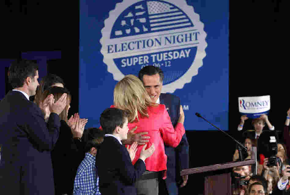 Mitt Romney hugs his wife, Ann, as he arrived at his Super Tuesday rally in Boston. Romney narrowly beat Santorum in Ohio. 