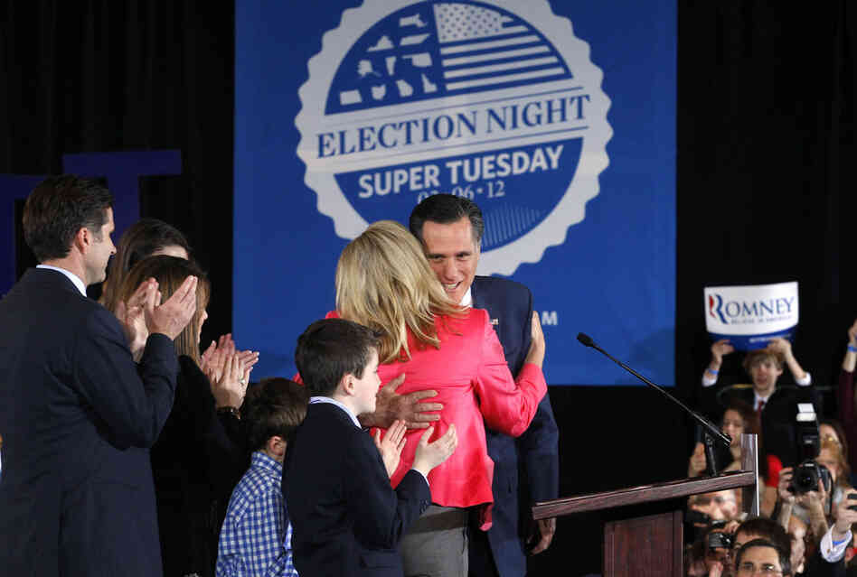 Mitt Romney hugs his wife, Ann, as he arrived at his Super Tuesday rally in Boston. Romney narrowly beat Santorum in Ohio. 