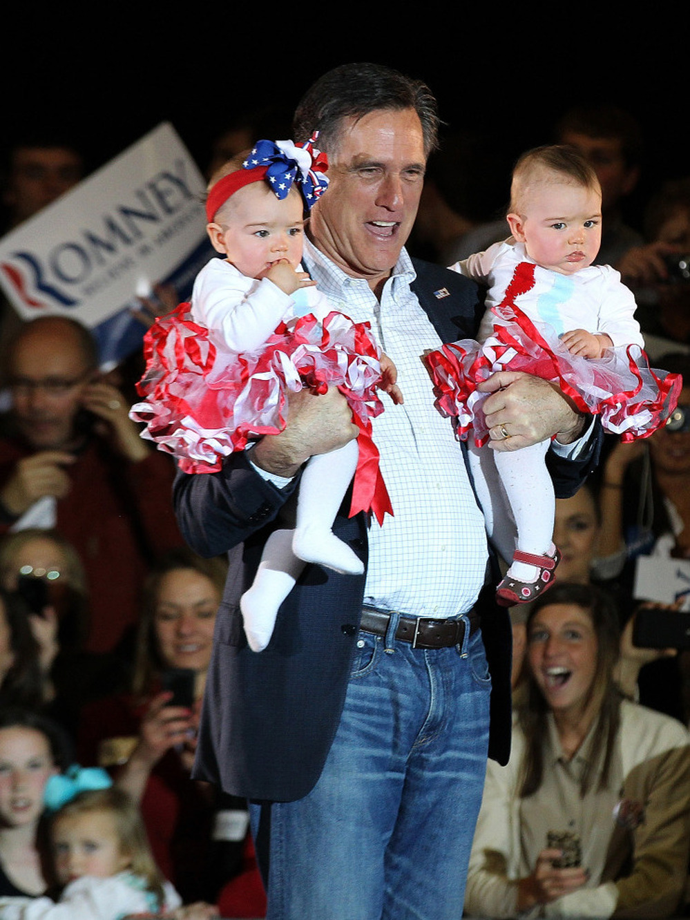 Mitt Romney holds babies during a campaign rally Sunday in Knoxville, Tenn. On Tuesday, Romney finished a distant second to Rick Santorum in the state.